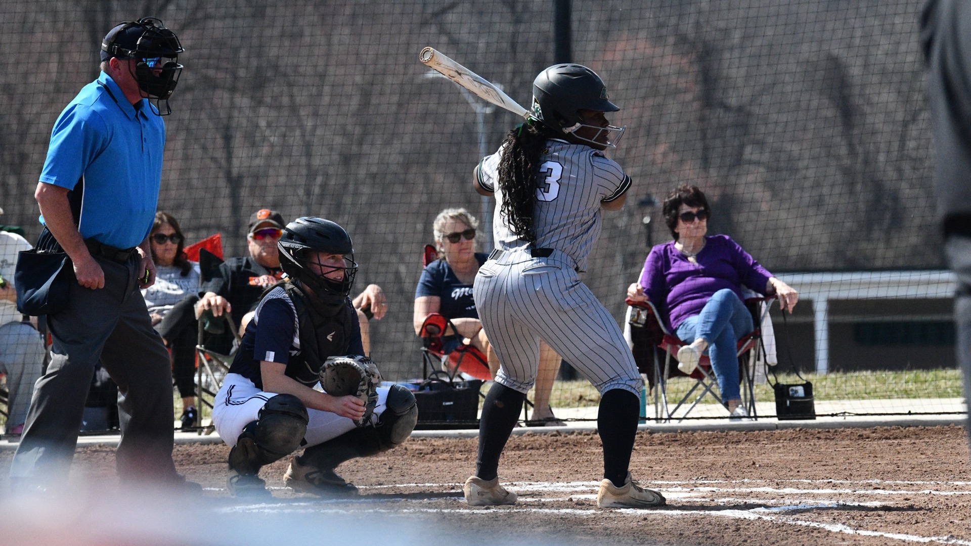 Sara Ward looking to hit the incoming pitch while in the batters box