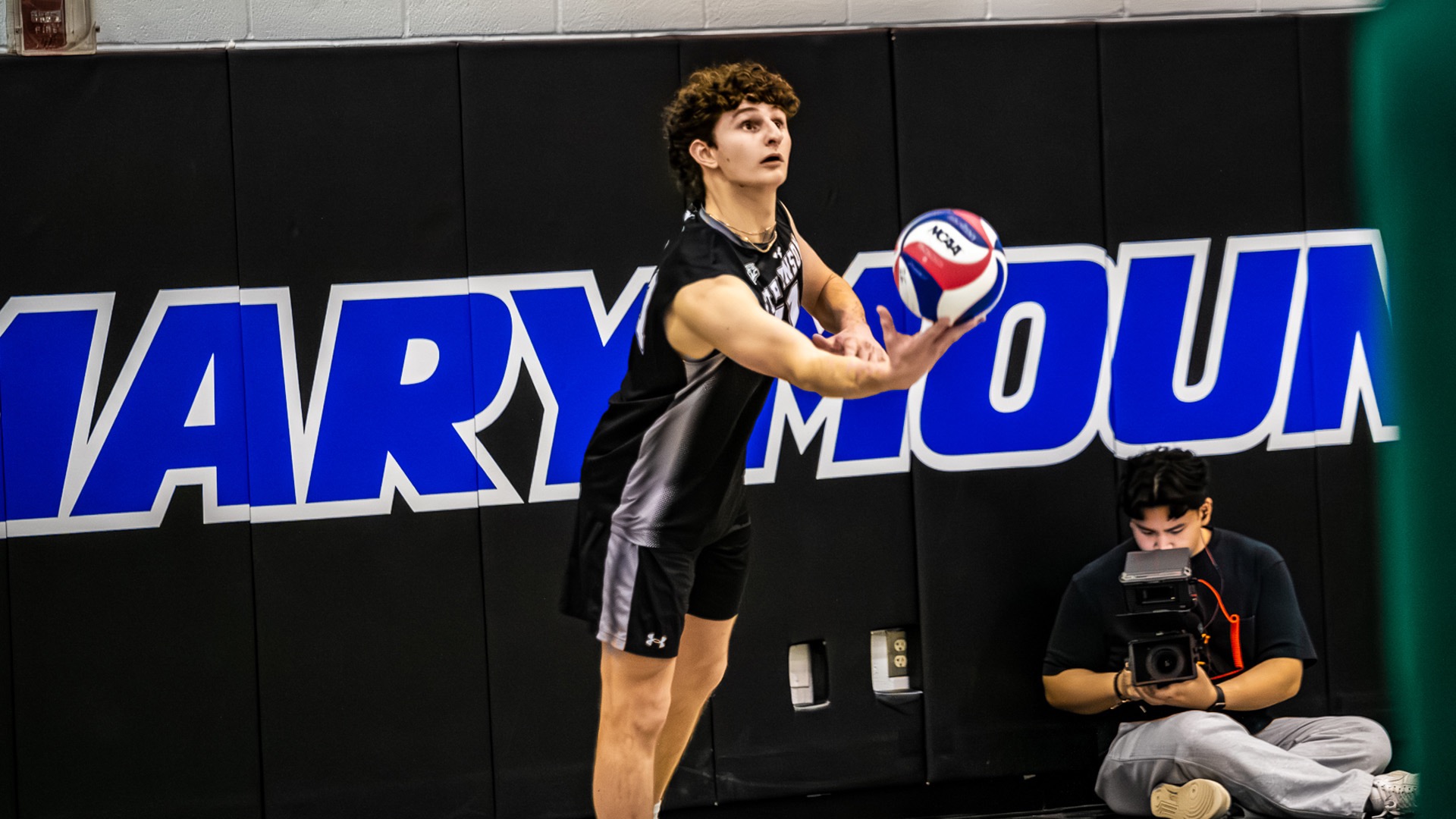 Adam DeRubertis looking for the perfect toss in the air to serve