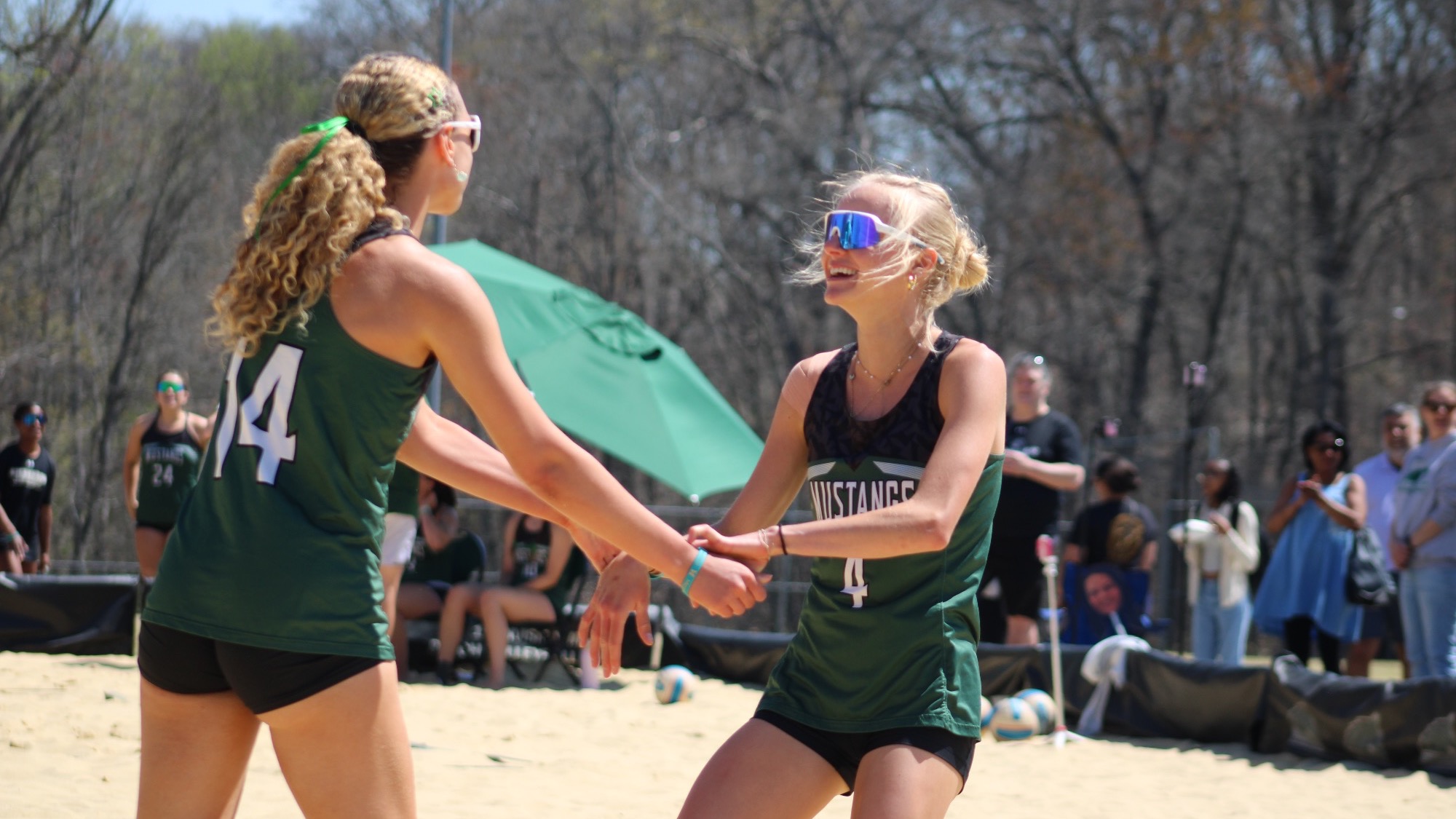Nicolette and Giulia post-point celebration
