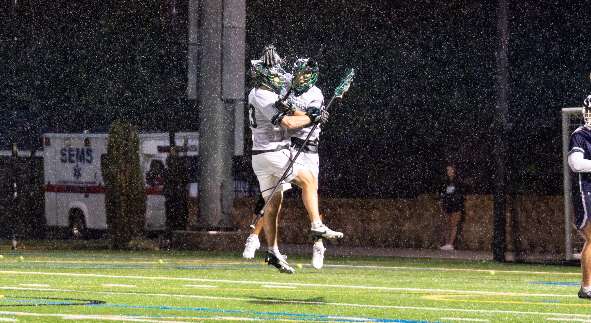 Men's Lax goal celebration