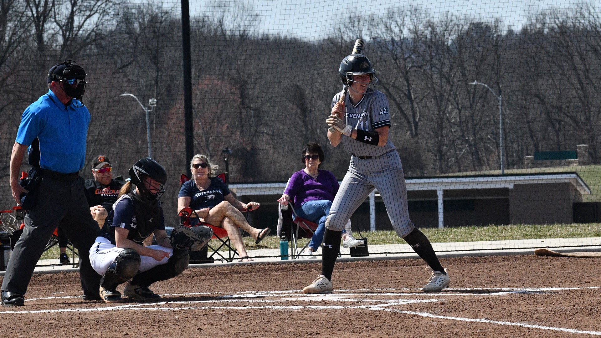 Tessa Boswell looking at the pitcher for the incoming pitch in the batters box
