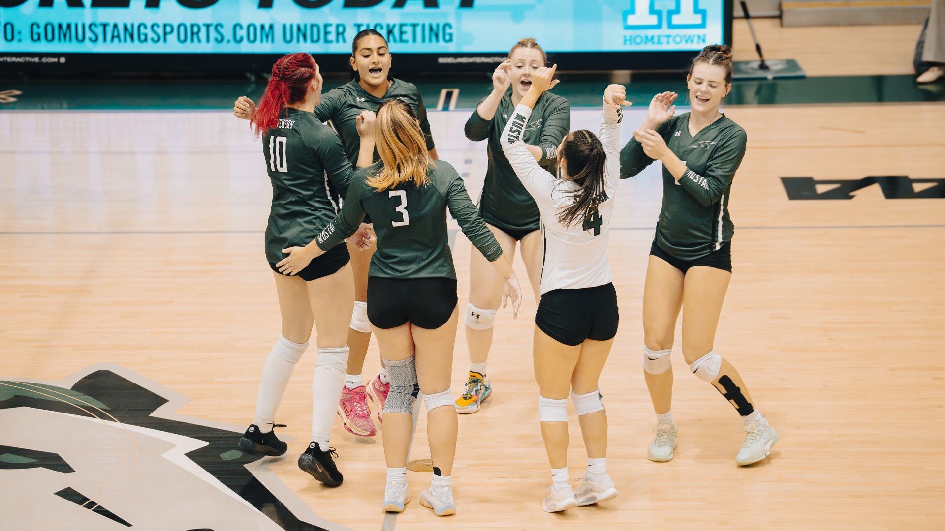 Team celebrating a point after a kill