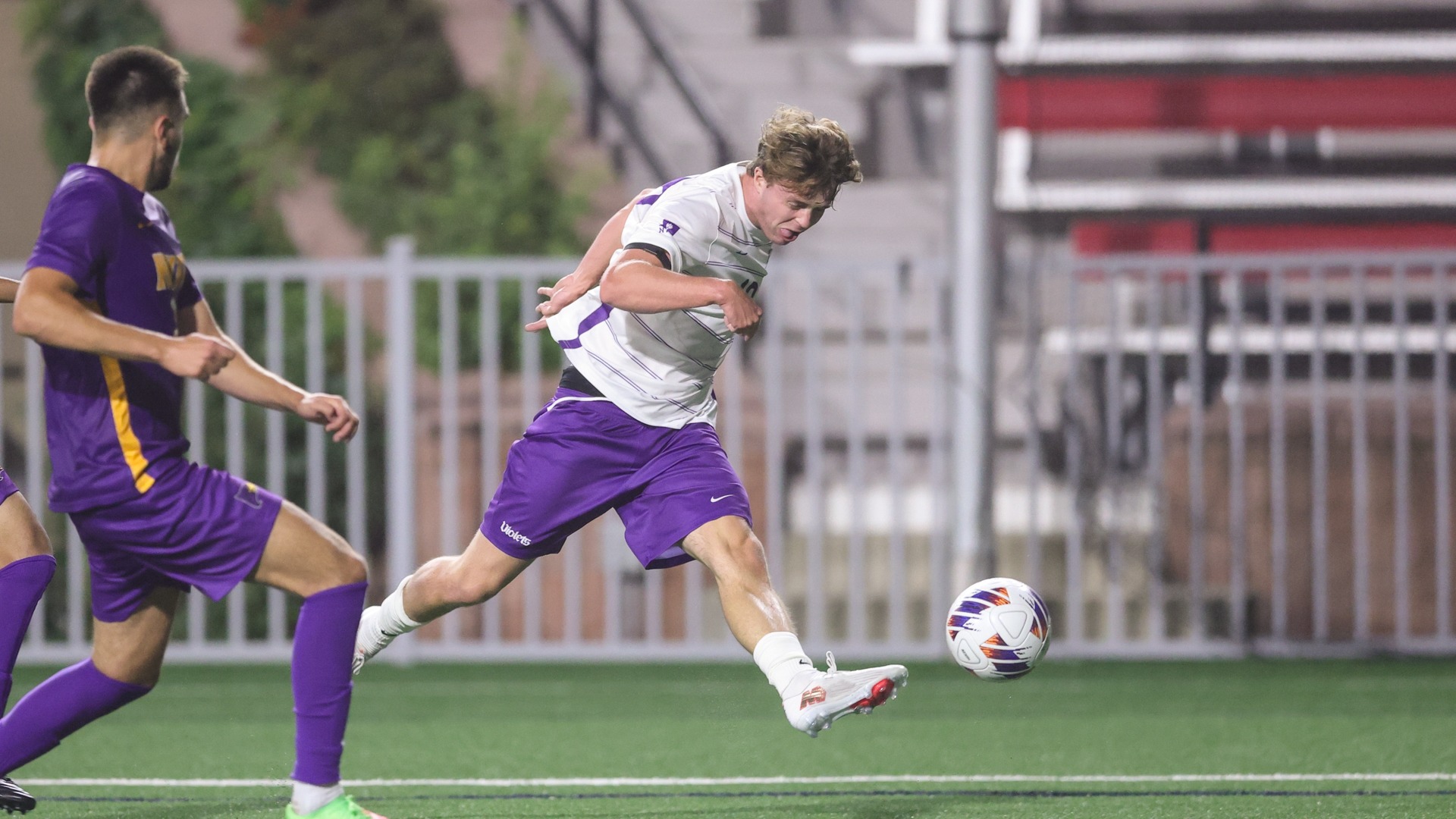 Edward Wester attempts a pass vs. Hunter College