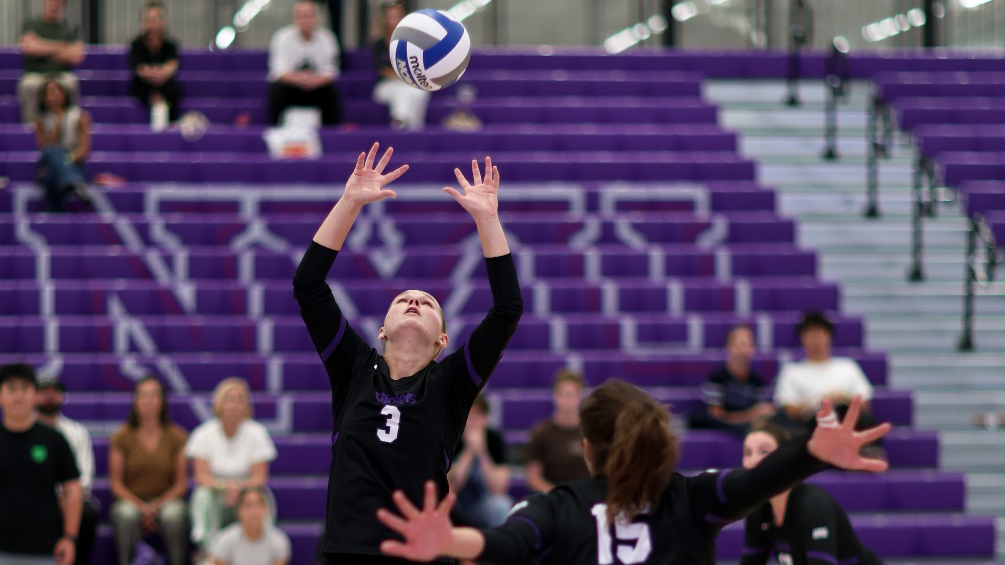 Kate Scherlacher fires eight service aces against Vassar.