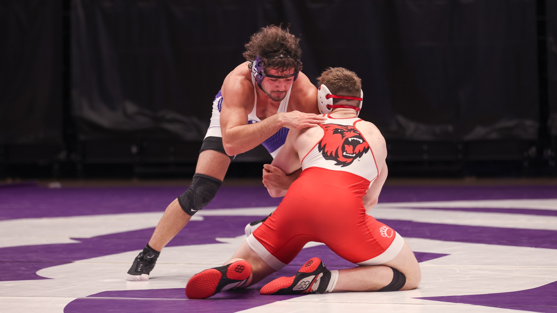 Mo Talebi wrestles against Bridgewater State