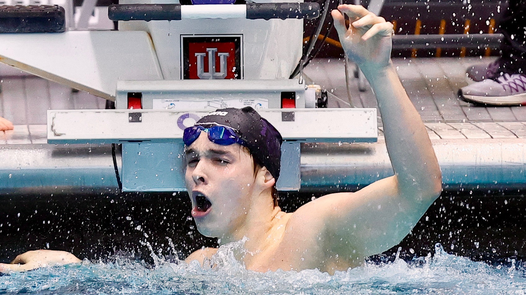 Max Nechydyuk celebrates after winning the 400 IM National Championship