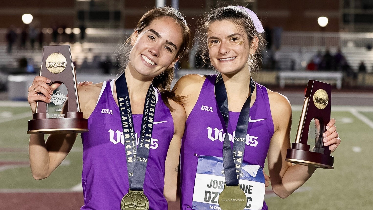 Kate Cochran and Josephine Dziedzic pose with their All-American trophies at the 2026 Outdoor National Championships