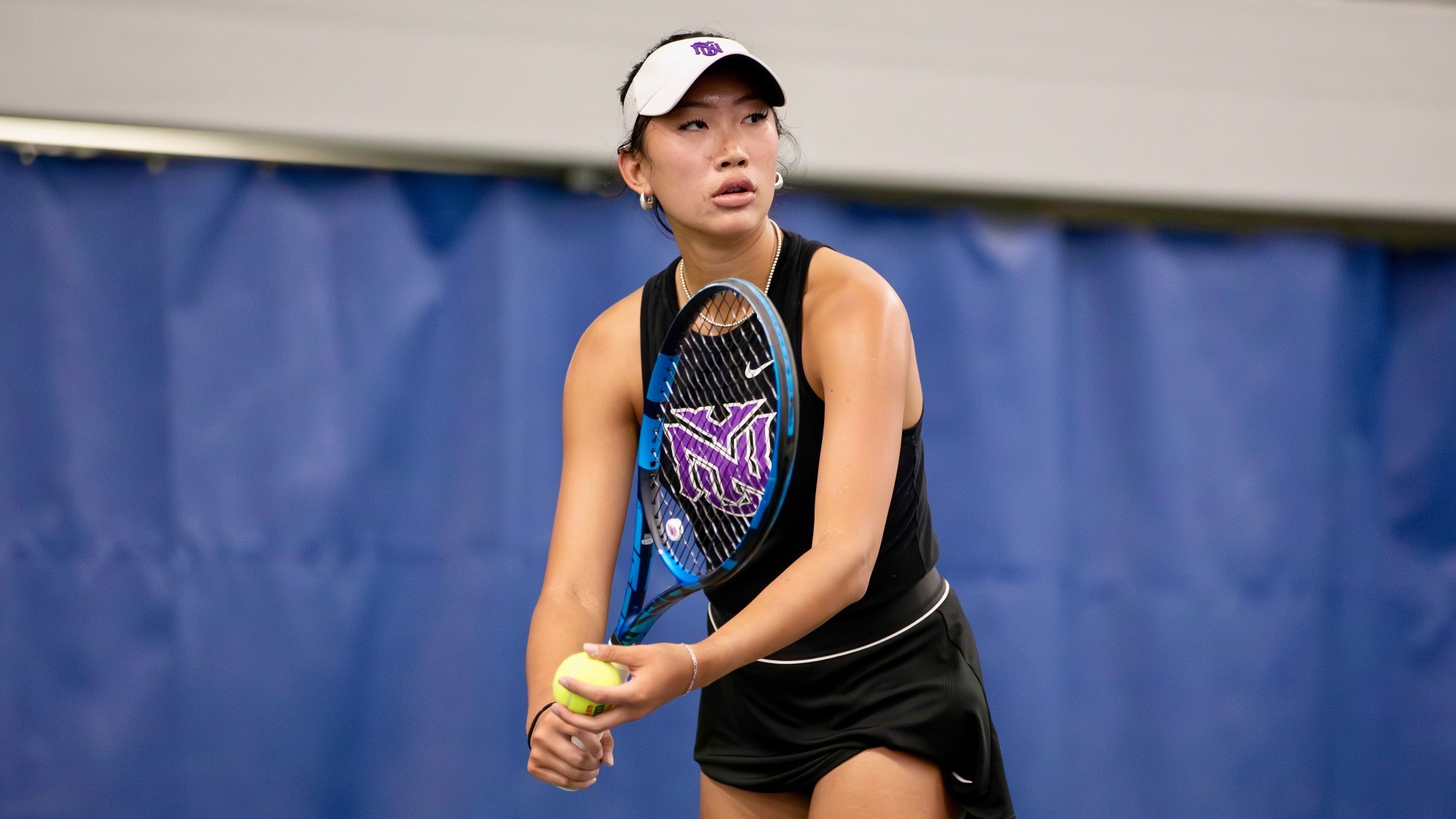 Victoria Wang serves at the 2026 NCAA Individual National Championships