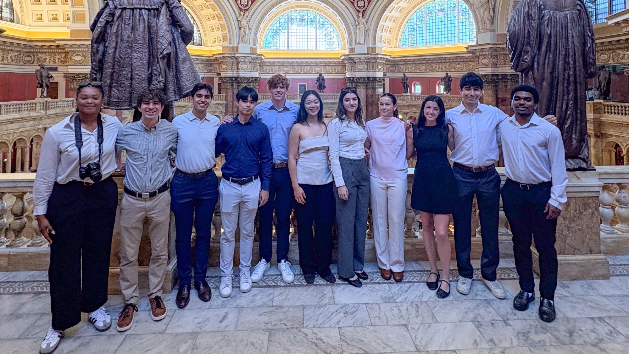 NYU student-athletes pose together in Washington, D.C. for the Violet Leadership Academy