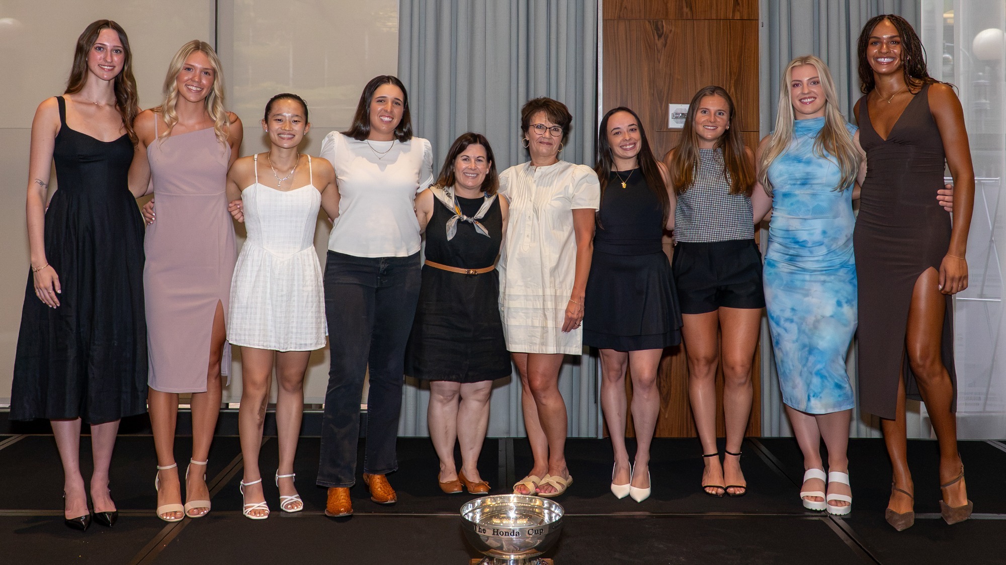 Kaley McIntyre poses with the Honda awards winners from Division I and Division II