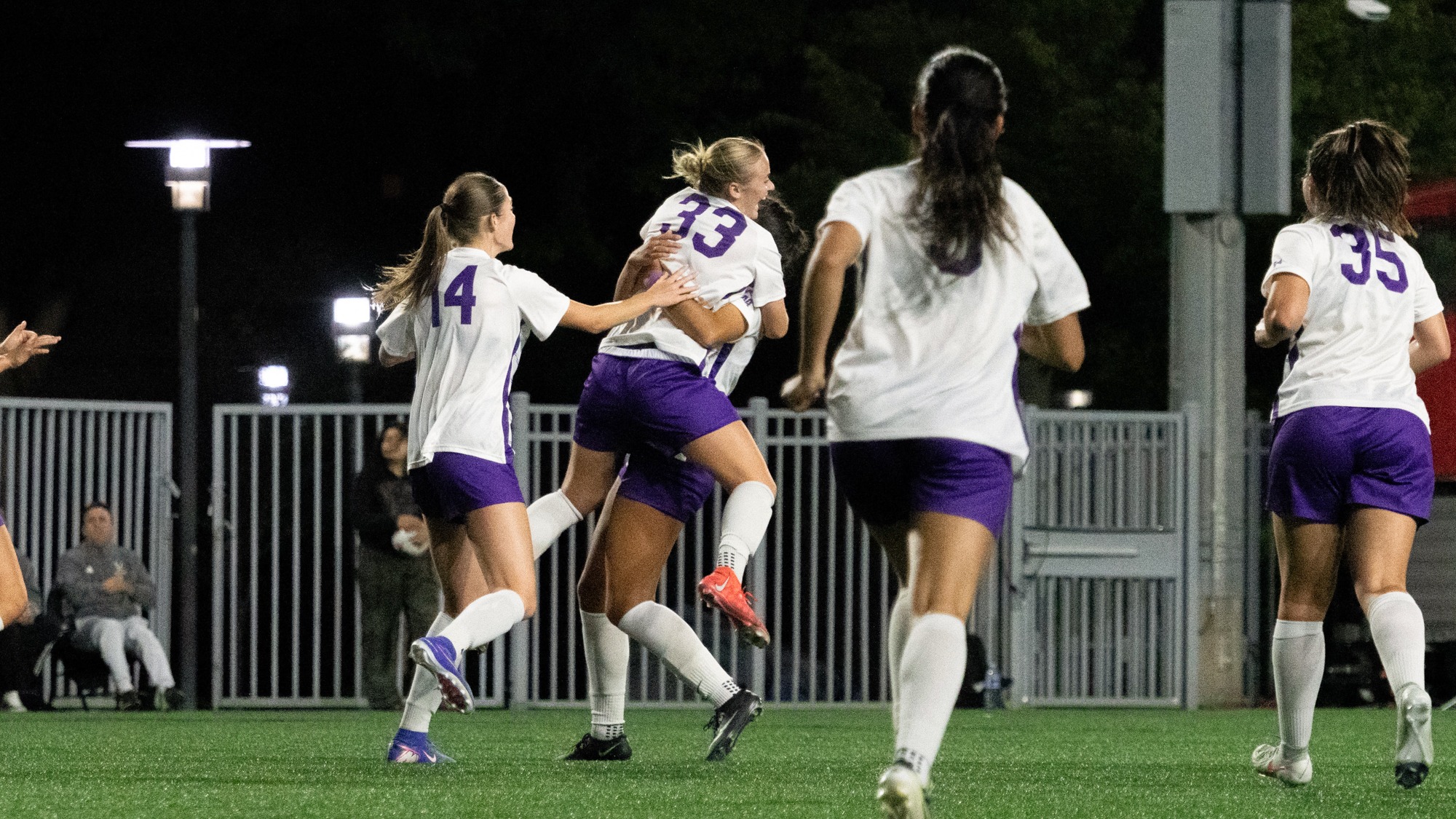 Meredith Theis celebrates with teammates after scoring a goal against Montclair State