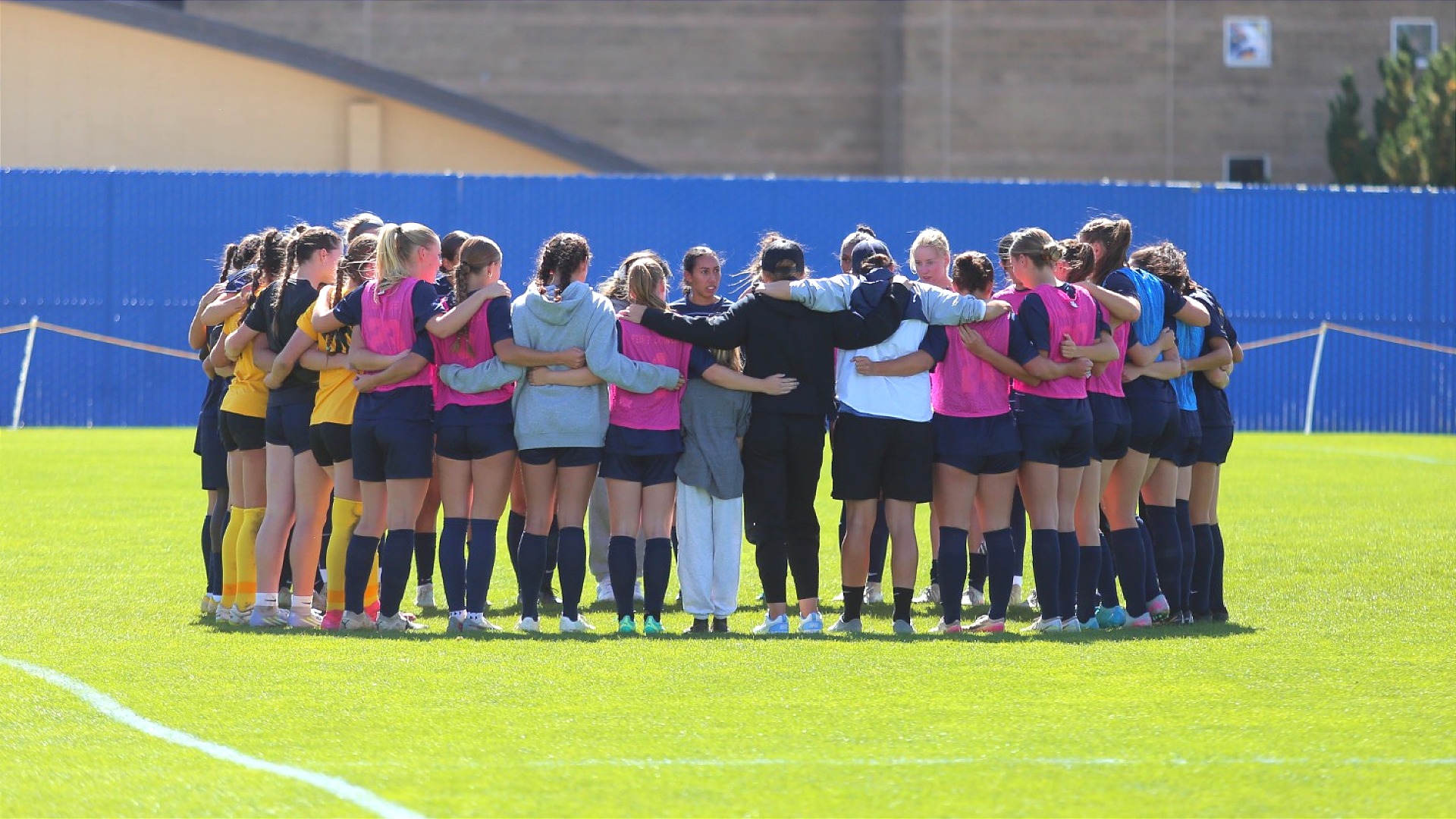 Women's Soccer Team Huddle