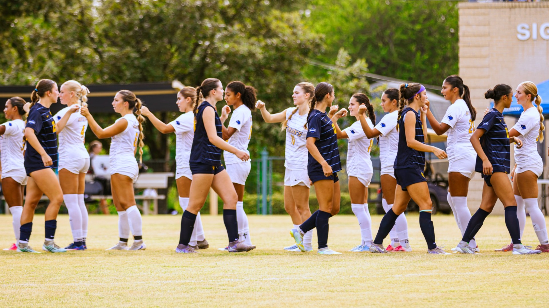 Women's soccer handshake line