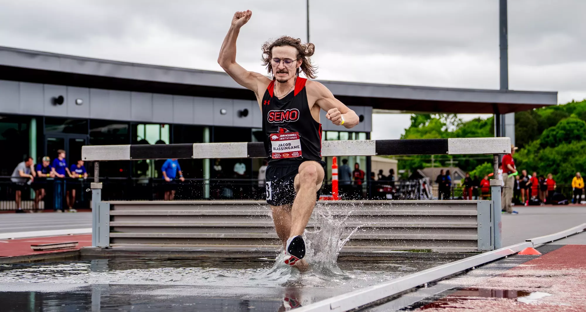 Jacob Blassingame landing in the steeplechase pool