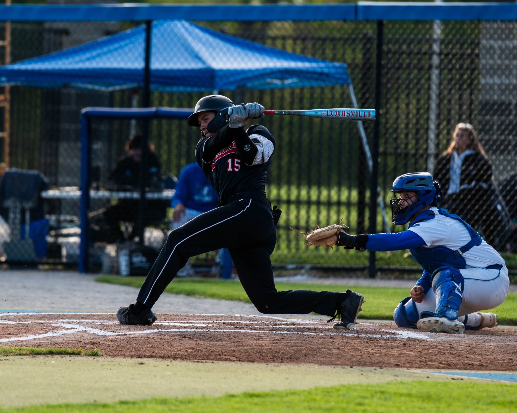 Ryan Lopetegui swinging at a pitch against Eastern Illinois