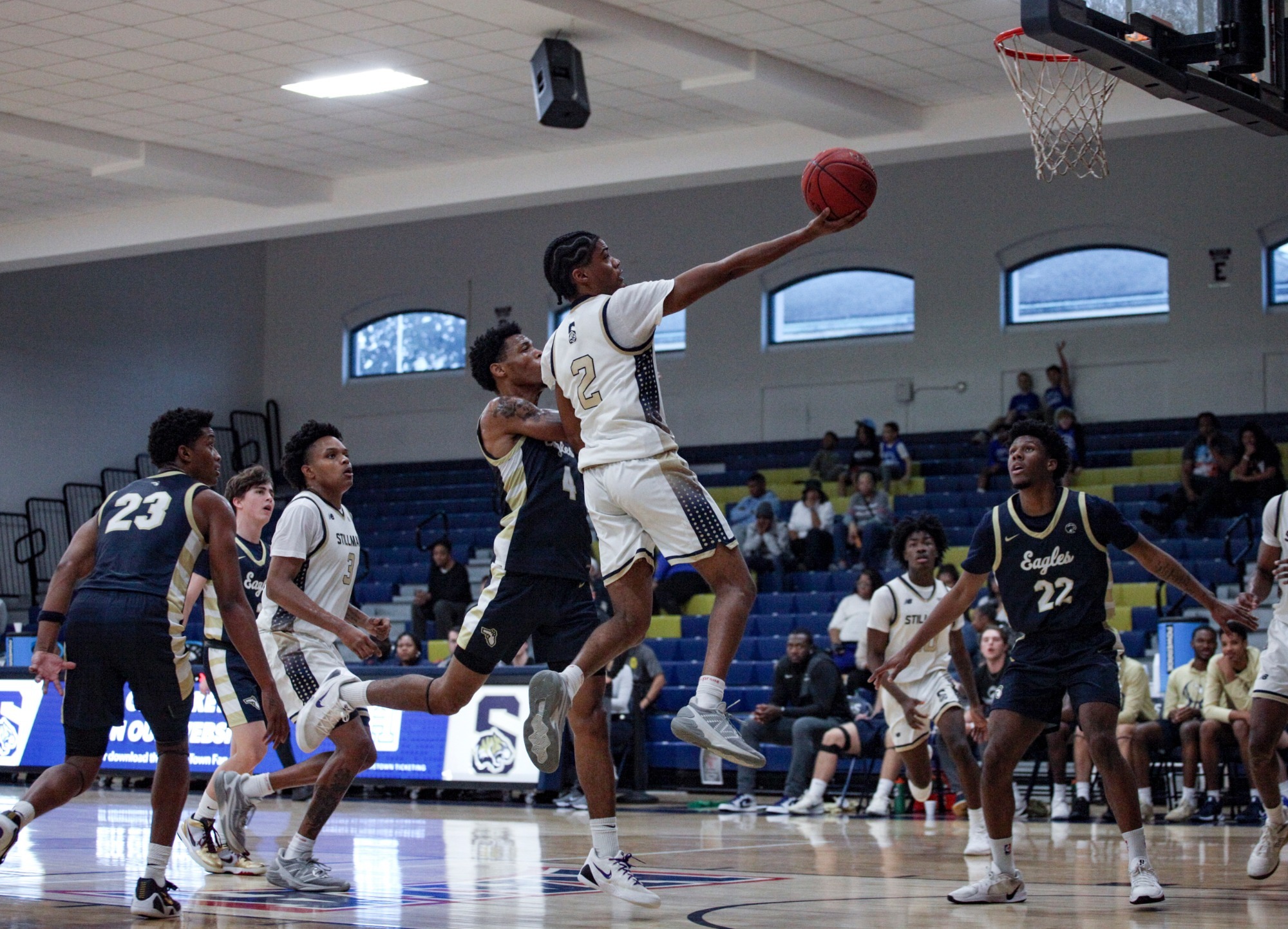 Josh Price drives to the basket