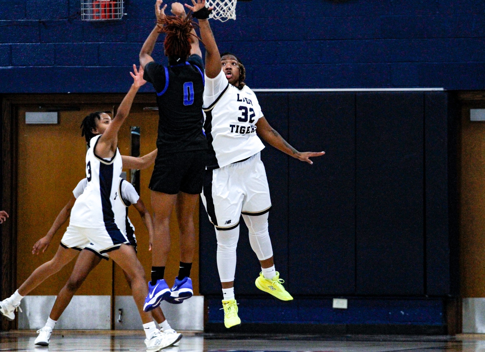 Jordan Harris blocks the ball