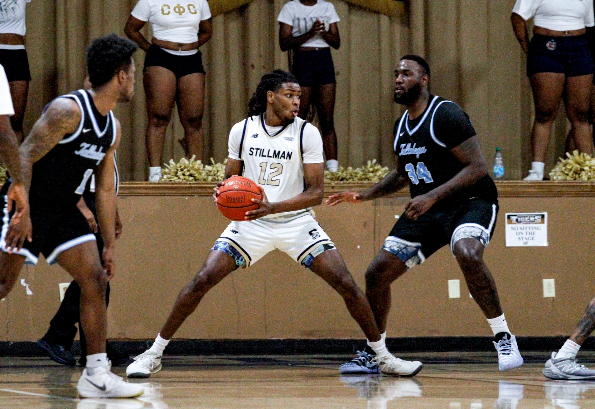 Allister Dixon protecting the ball