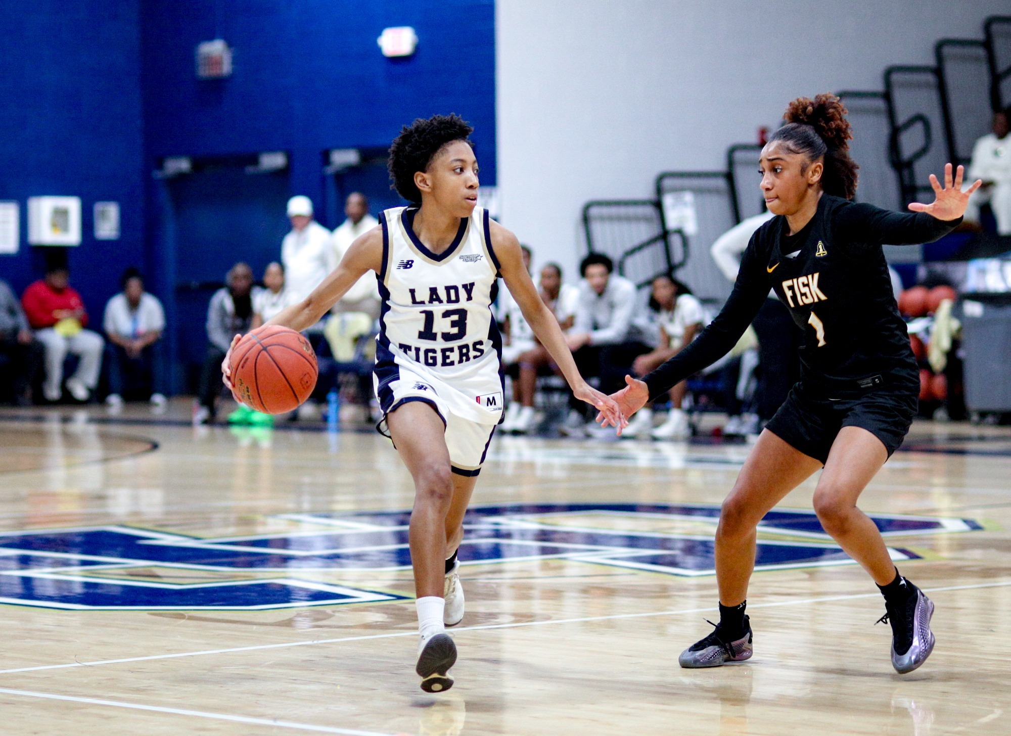 Jayla Young West scans the court