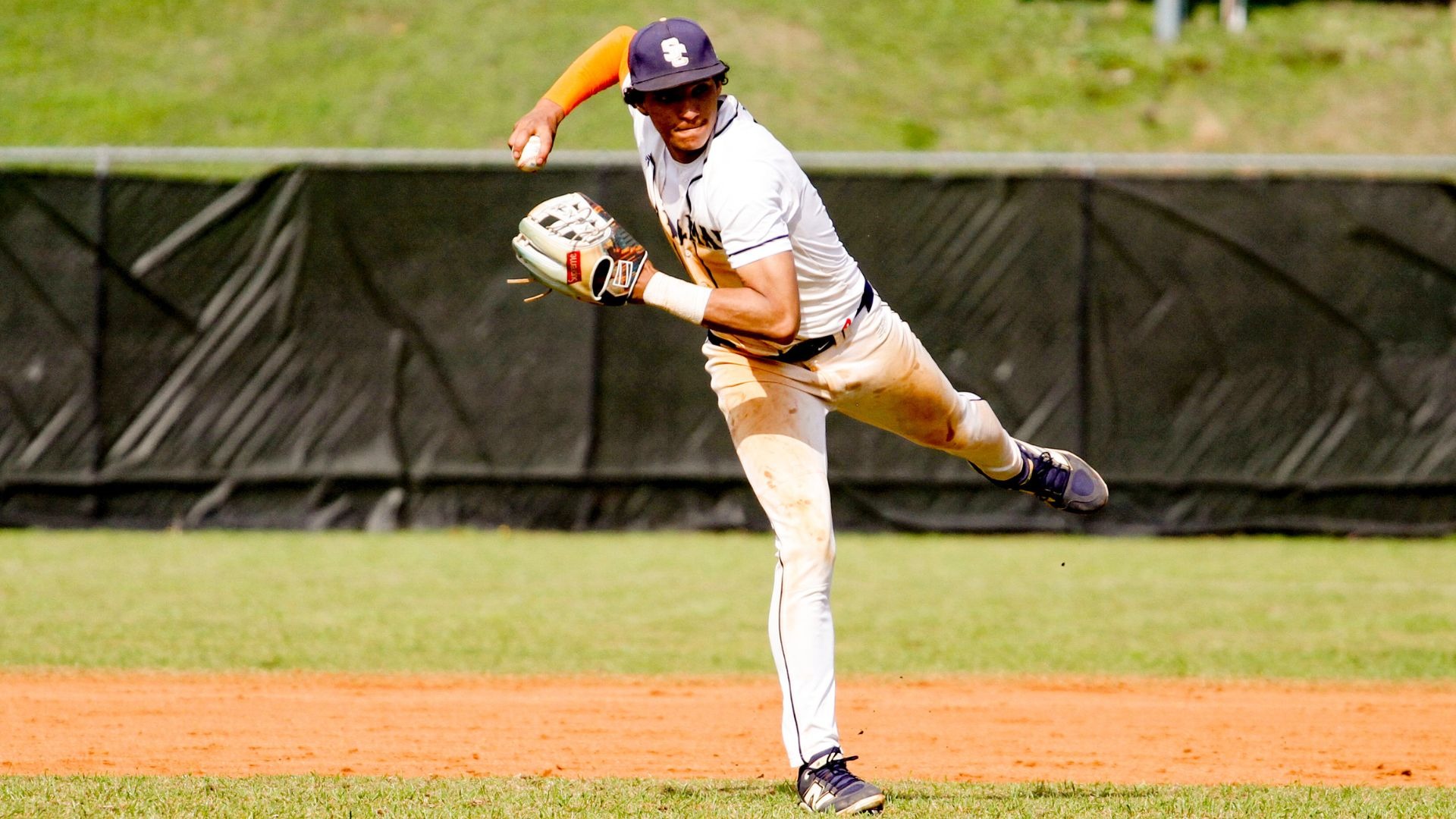 Stillman baseball player about to make a throw