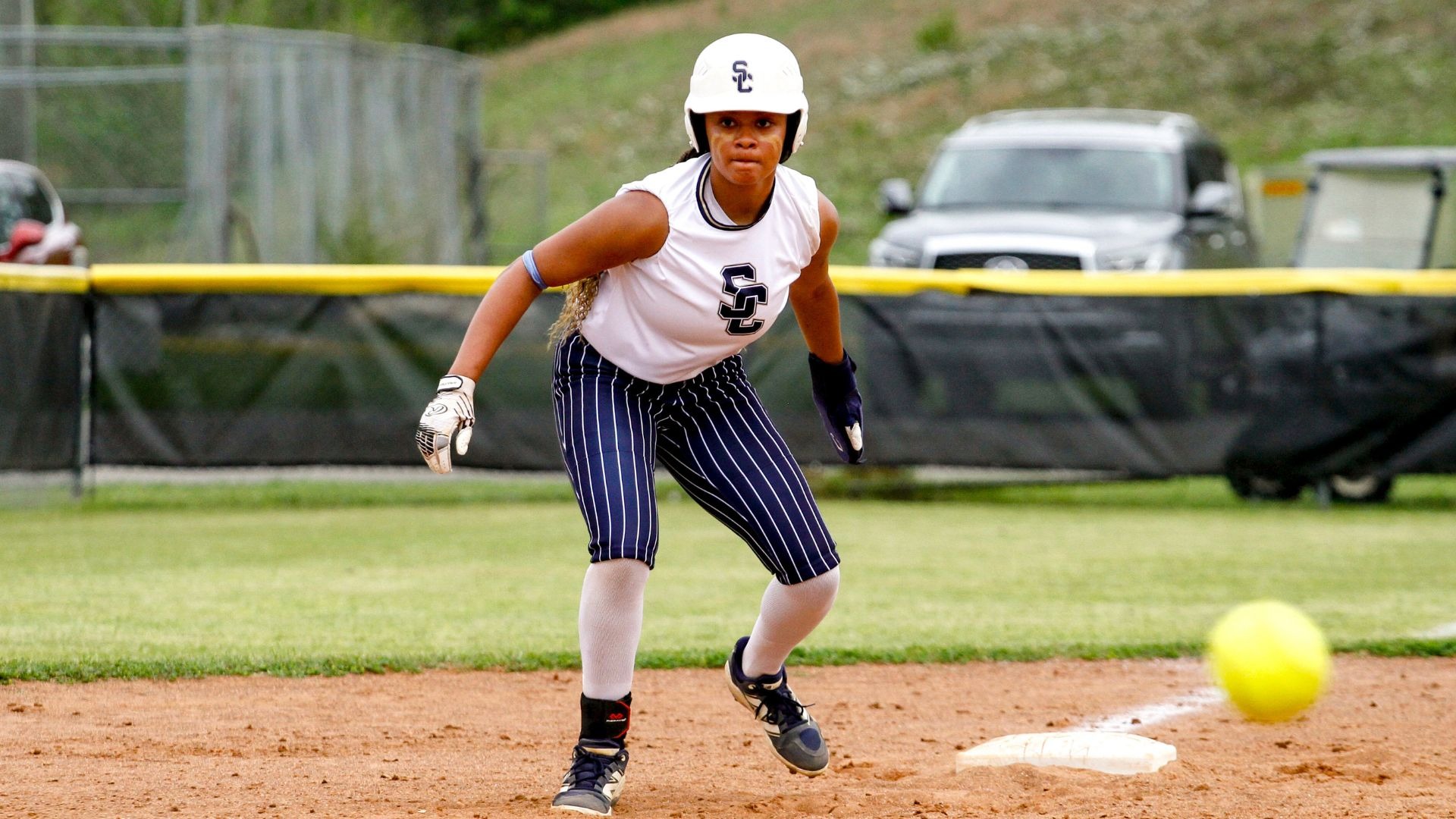 Addison Nuspl tries to score from third base