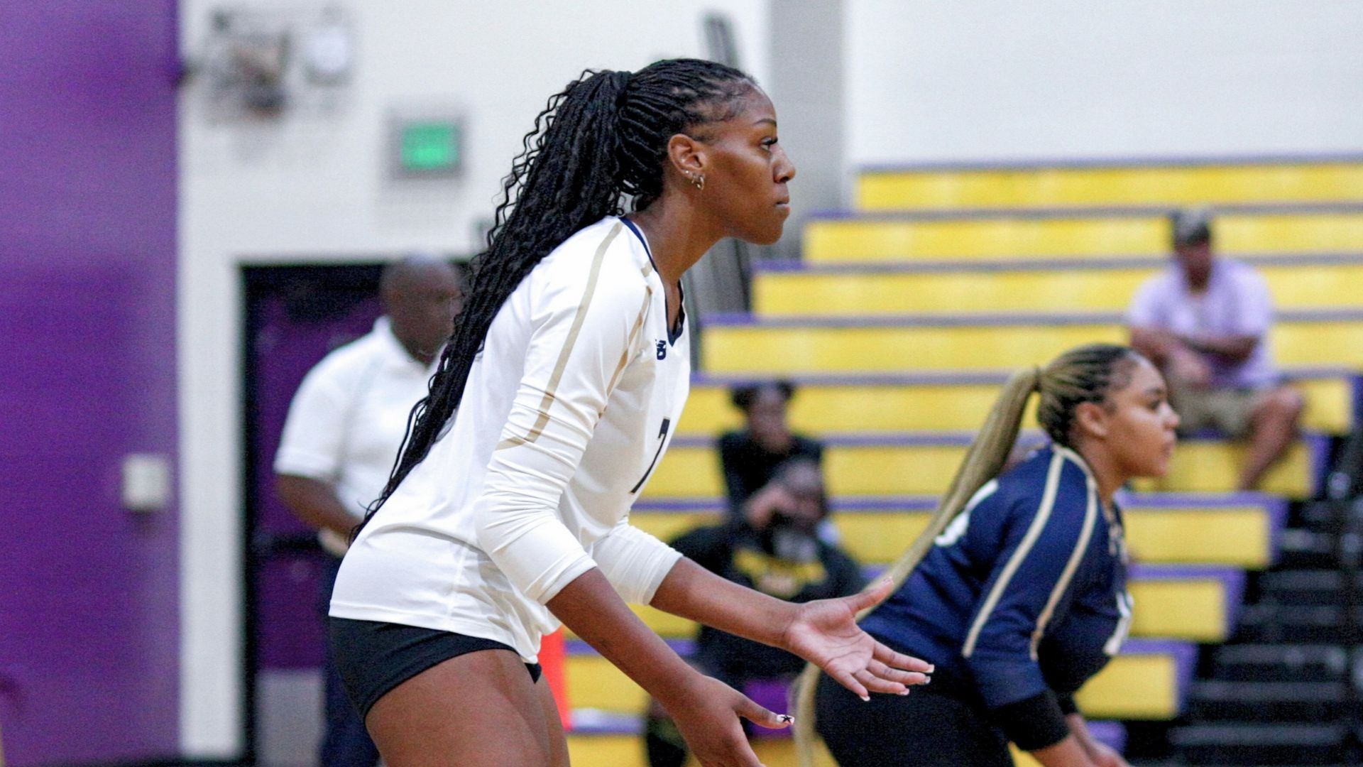Eva Stewart waits for a reception against Miles College