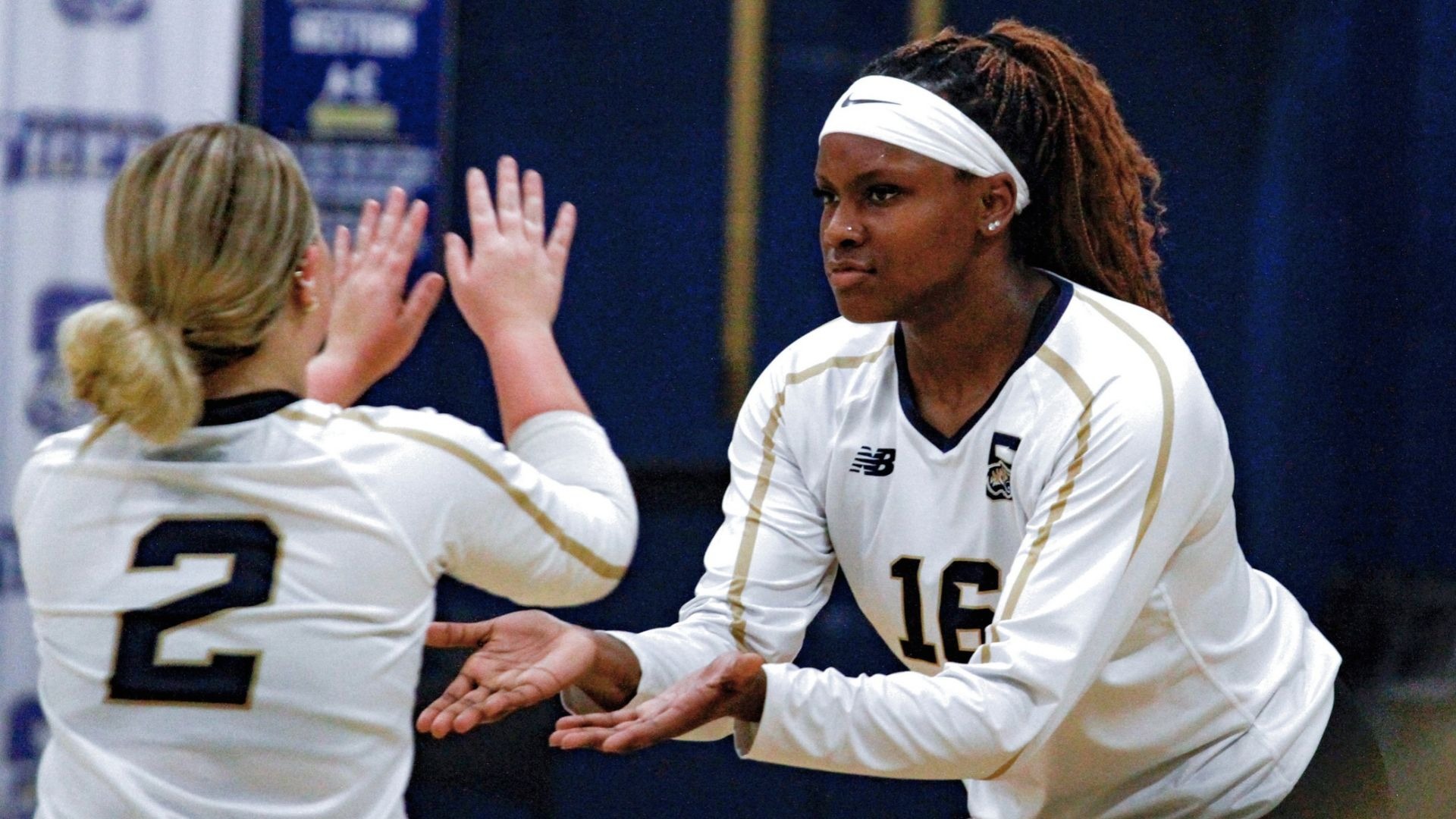 Ava Cameron and Shelby Morris congratulate each other against USSU