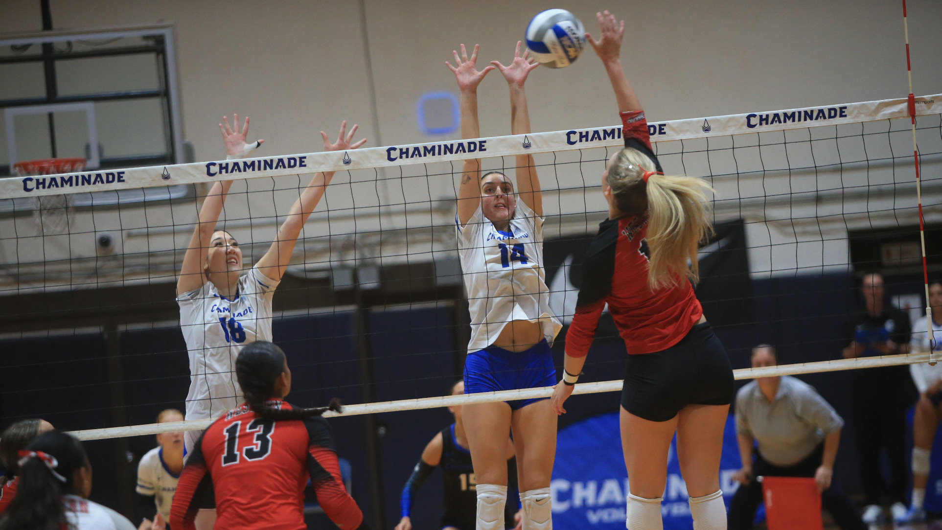 Tabby Allen and Siria Guerini block vs. Western Colorado