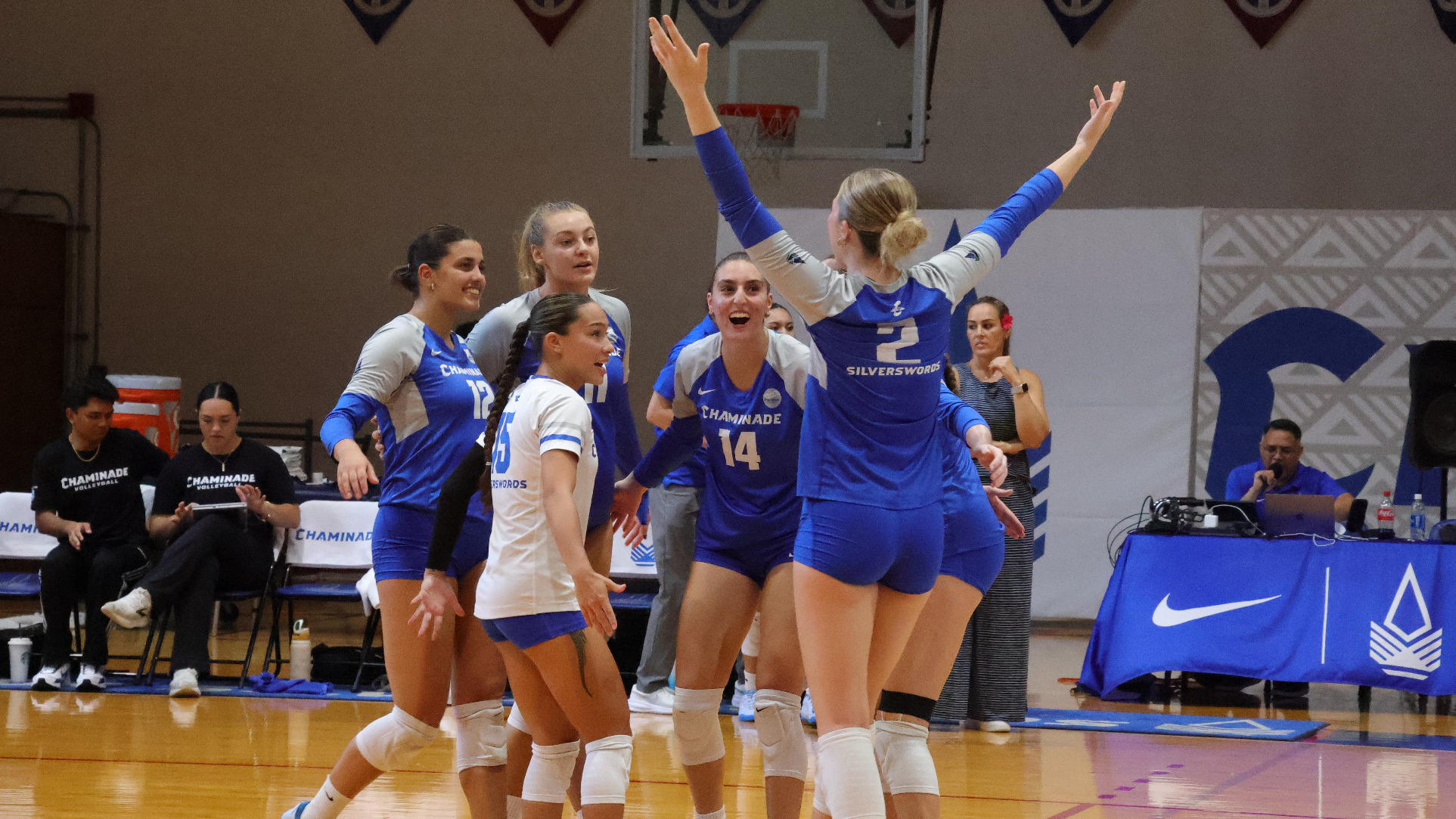 WVB team celebrates a point vs. Western Oregon