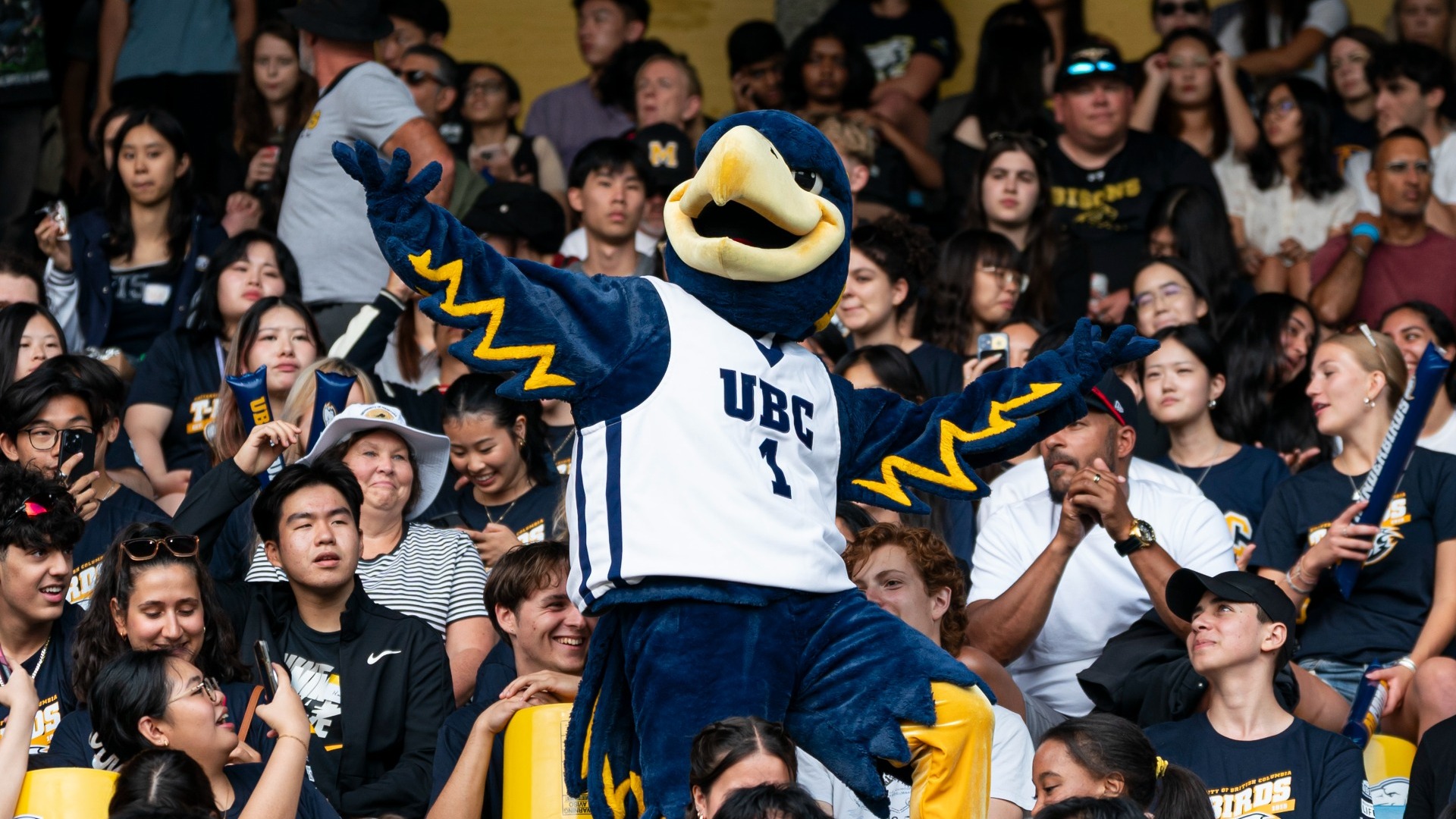 Thunder is in the middle of a full crowd at Thunderbird Stadium