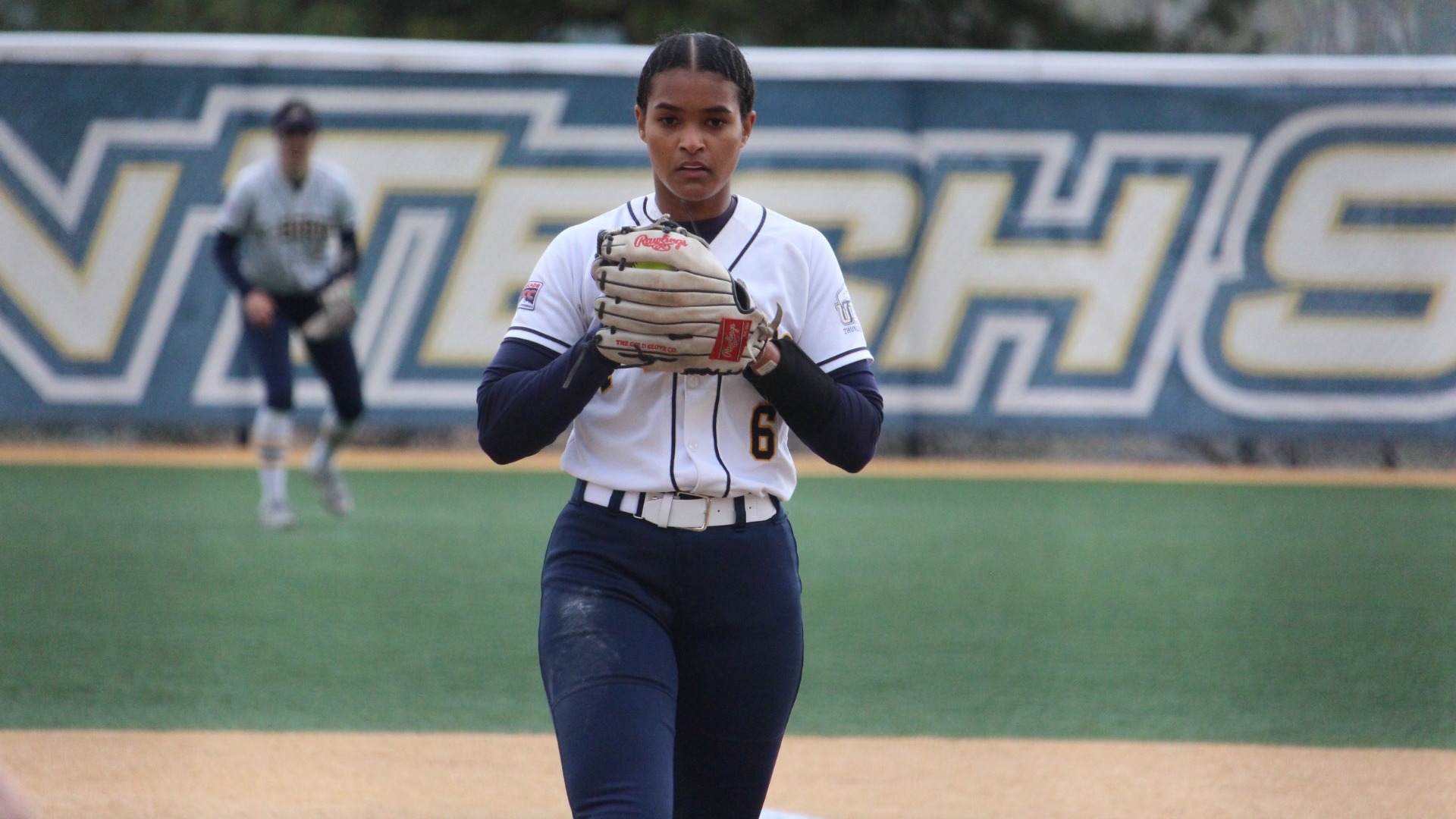 Carleen Murray holds the ball in her glove as she prepares to pitch