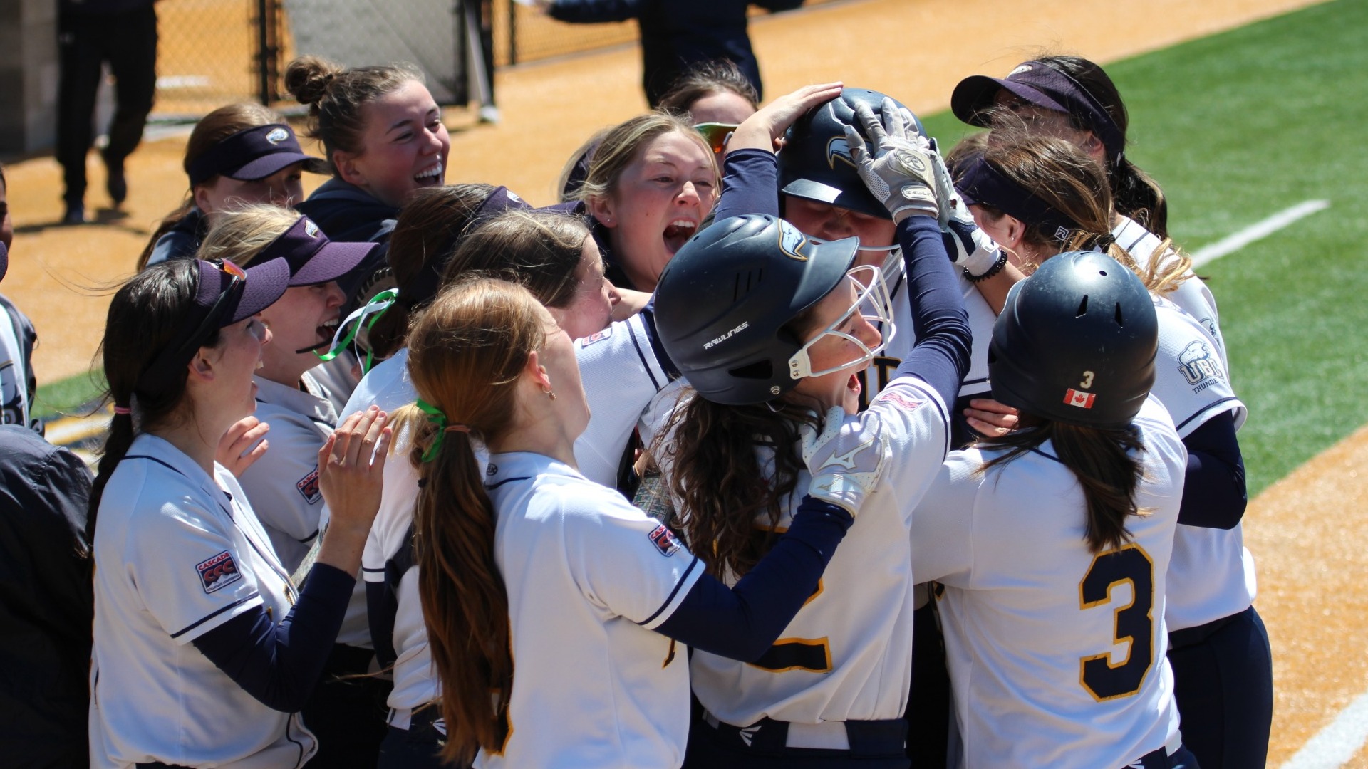 UBC Thunderbirds Softball mobbing two-way superstar Shae Sever at home plate after she hit a walk-off homerun to eliminate host, No.1-seed and NAIA No.2-ranked Oregon Tech at their ballpark in the Cascade Conference Softball Tournament