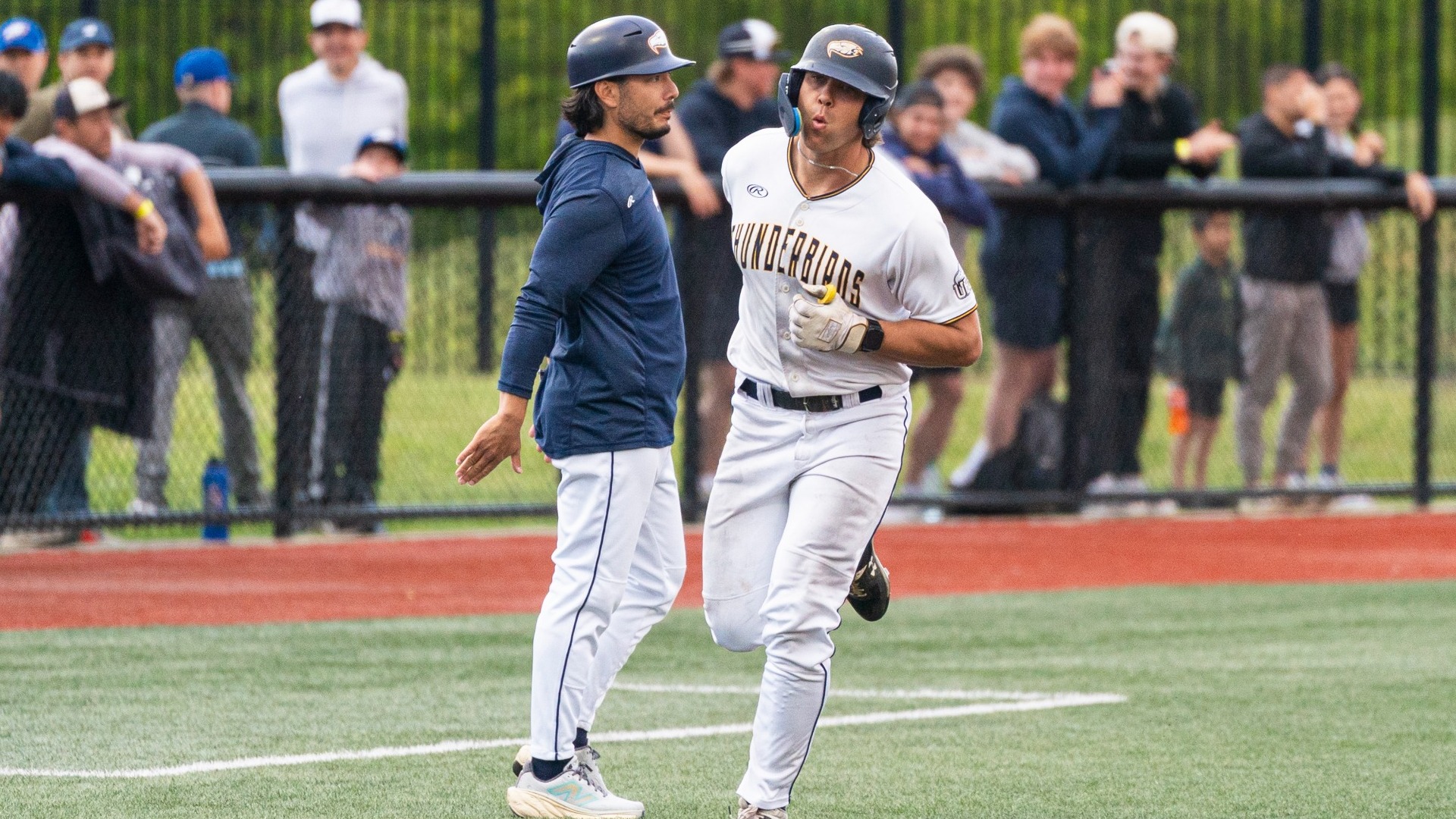 Jonny McGill rounds third after a home run