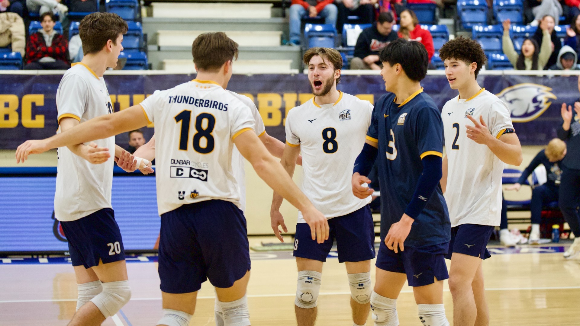 A group of UBC players come together to huddle up after a point