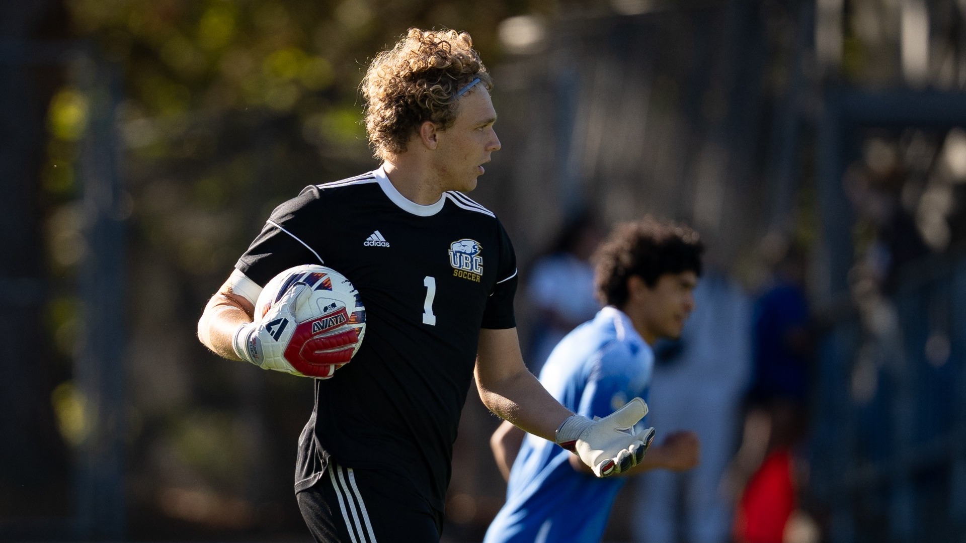 UBC netminder Jack Garner holds the ball while evaluating options down field during a game against the UVic Vikes on Oct. 11, 2026