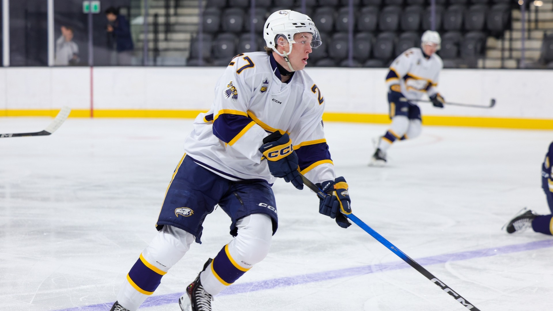 Nathan Sullivan picks his head up as he skates forward
