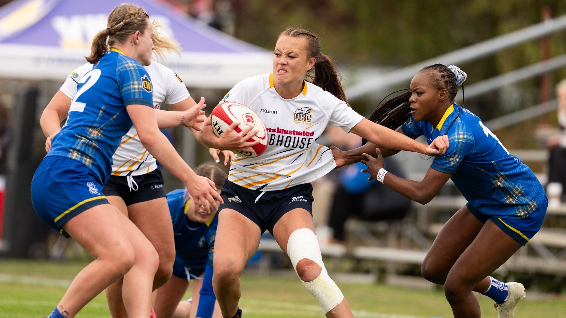 A UBC player tries to get past multiple Pronghorns defenders grabbing at her