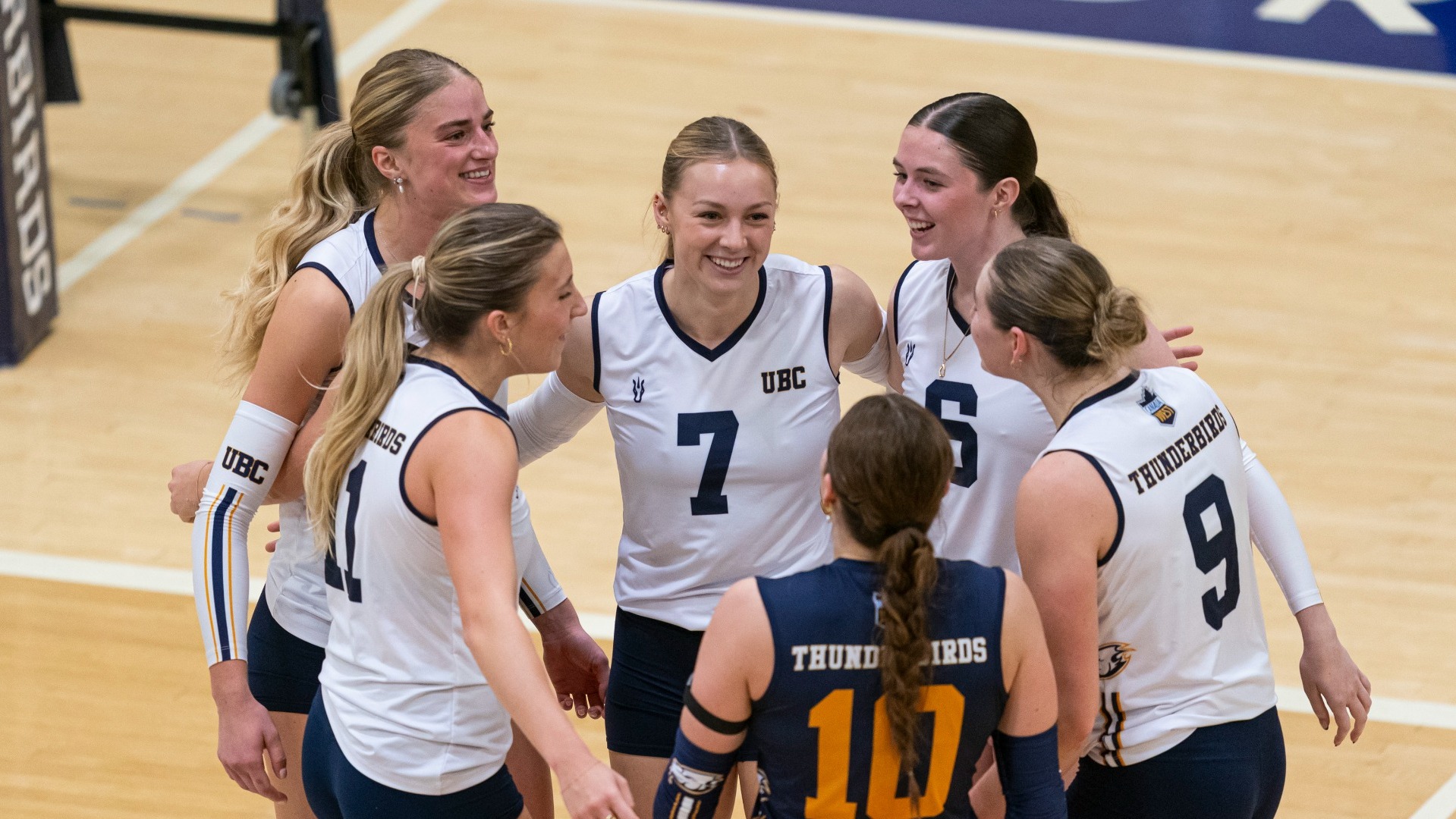 The UBC T-Birds huddle together to celebrate a point during a game against the Calgary Dinos on Oct. 23, 2026