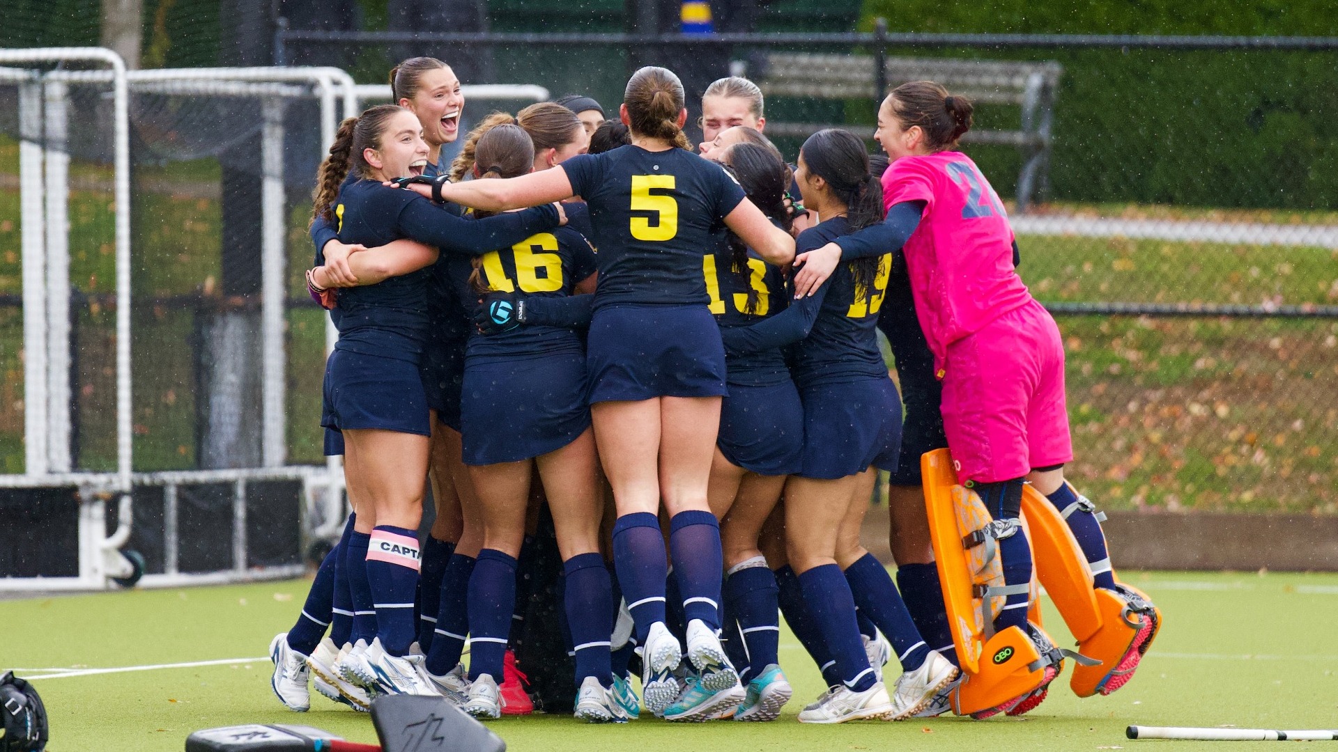 The UBC Thunderbirds come together near the net to collectively celebrate their conference-clinching win after a game against the UVic Vikes on Oct. 24, 2026