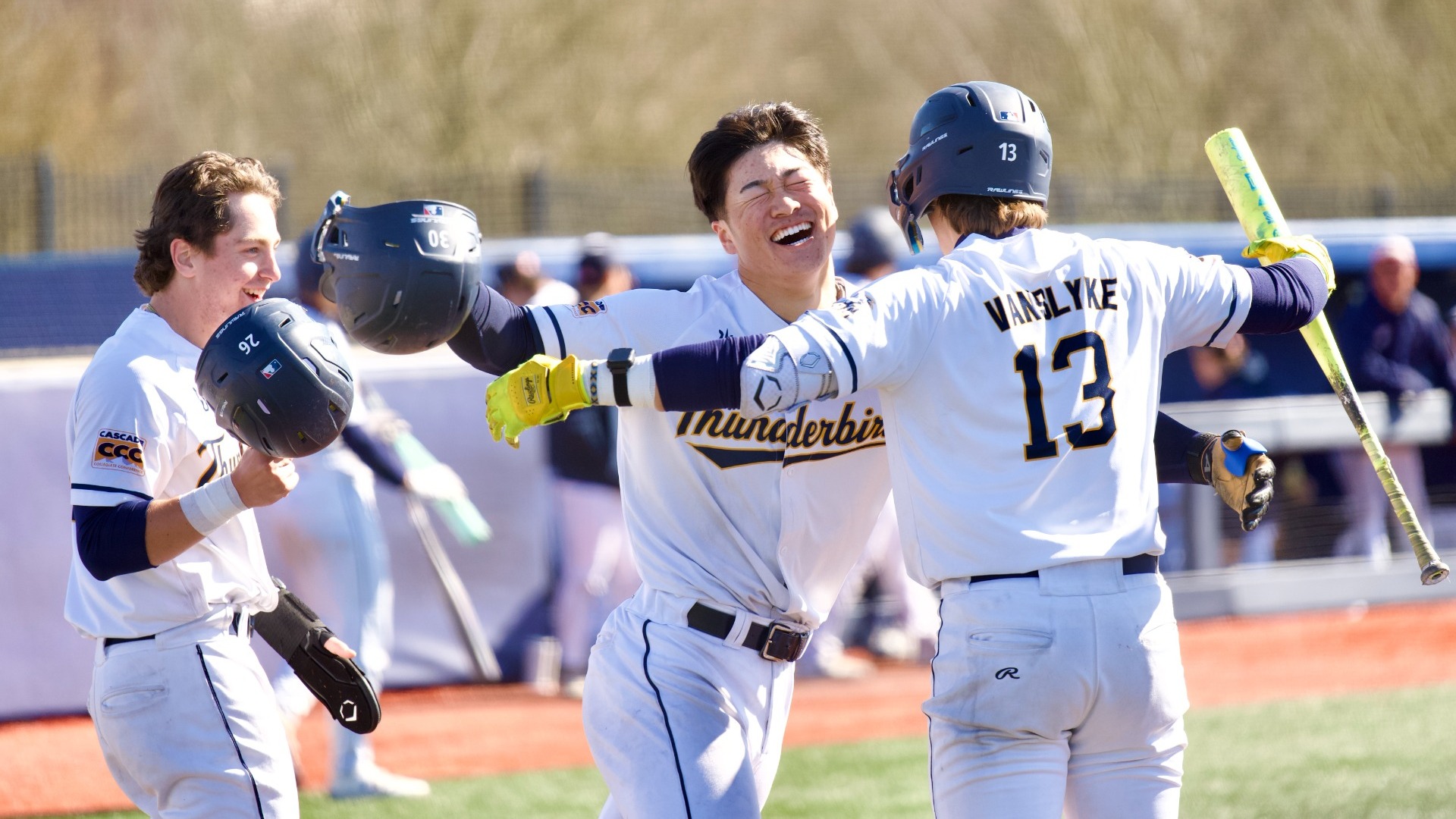 UBC Thunderbirds outfielder Kansai Sugimoto looking ridiculously happy as he hugs a teammate after hitting a homerun