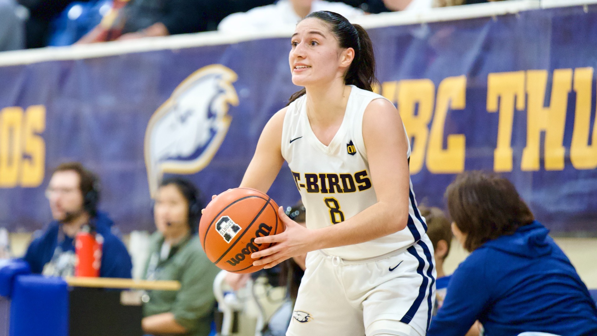 Sara Toneguzzi holds the ball near the sideline