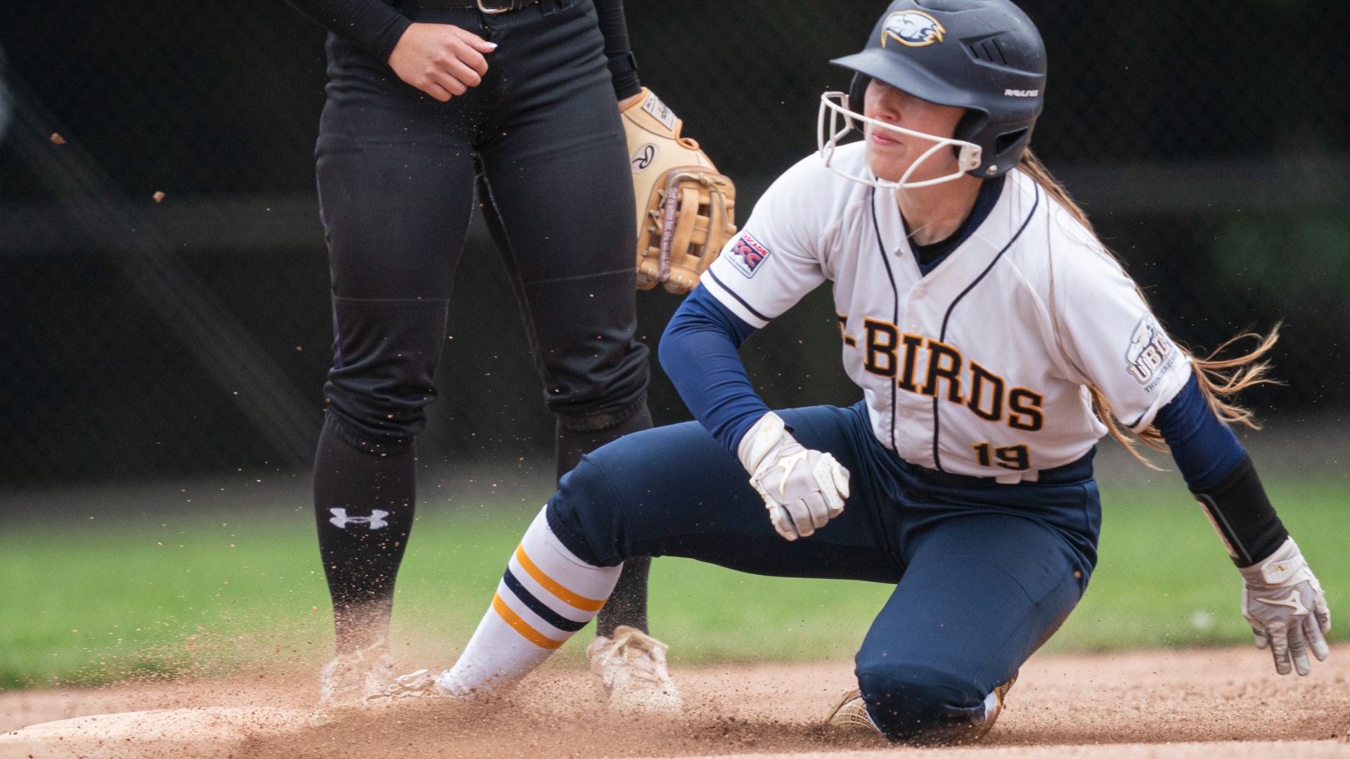 Brielle Donoghue slides into a base during play