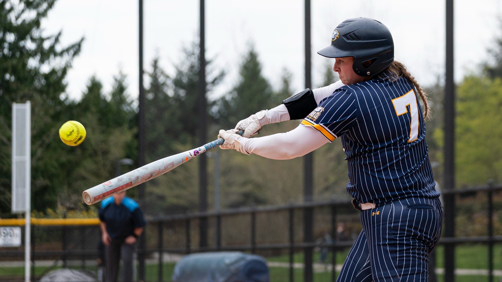 Jessica Heutink swings her bat at the ball