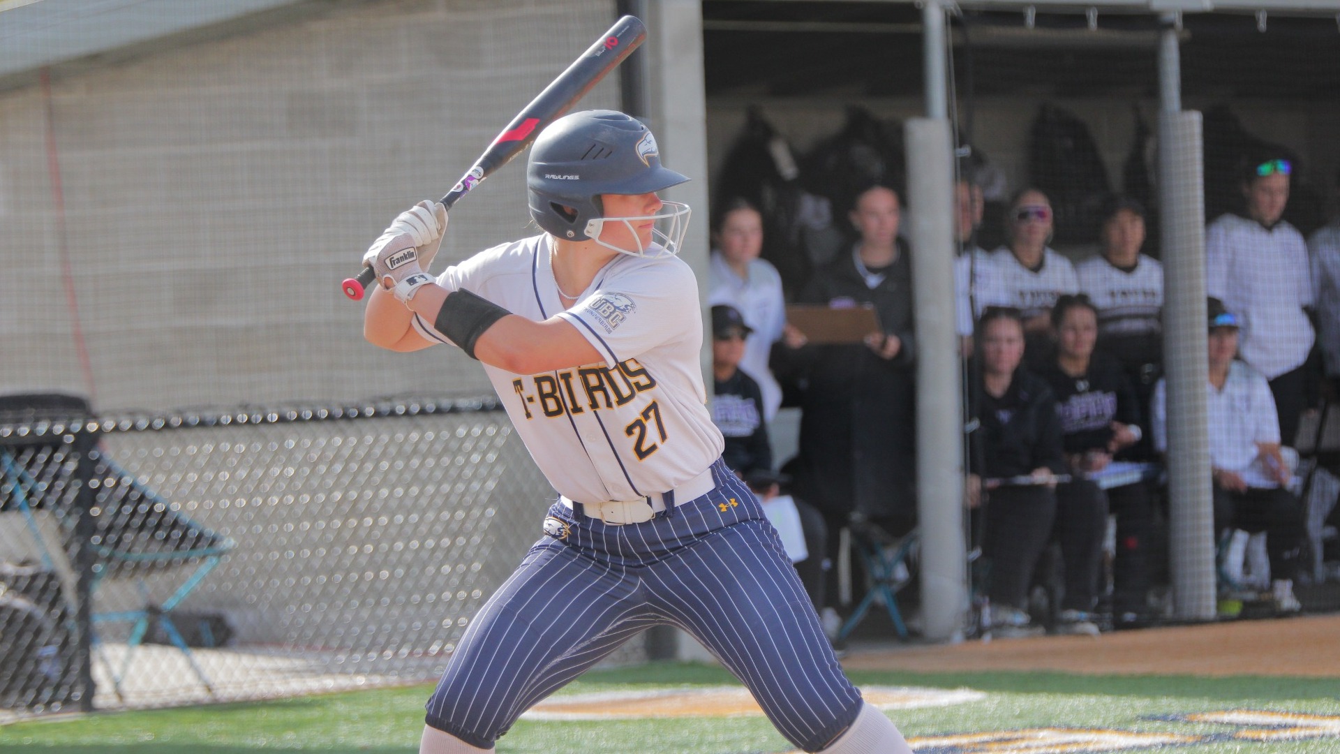 Zoe Willington stands in the batters box ready for a pitch