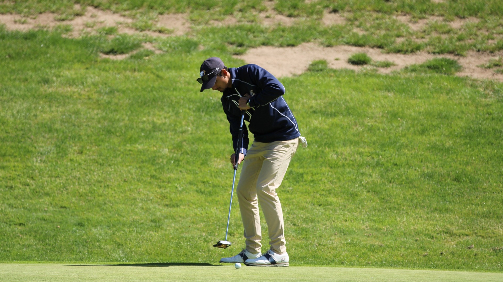 Aneesh Kaura hits a putt at the CCC Championship