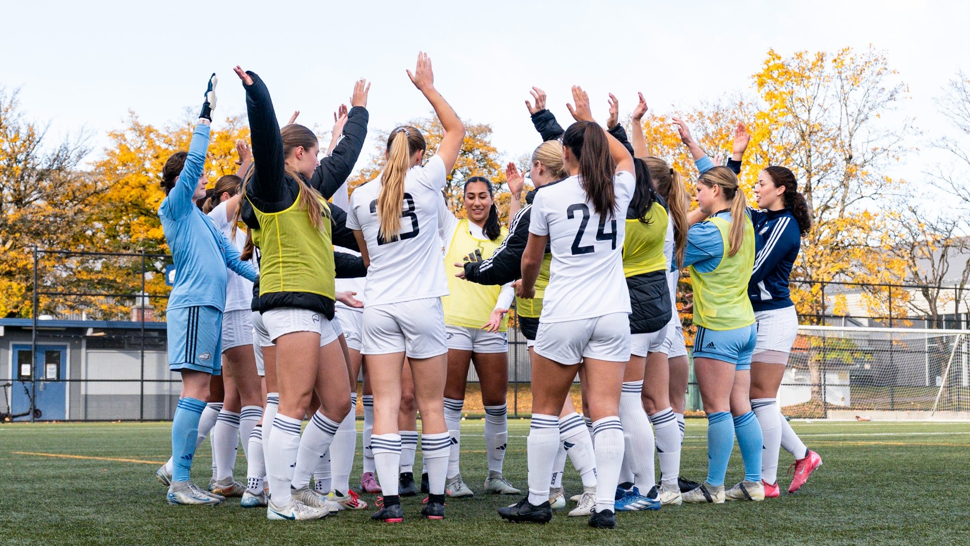 UBC Thunderbirds close out a huddle before a Final Four game against the Mount Royal University Cougars.