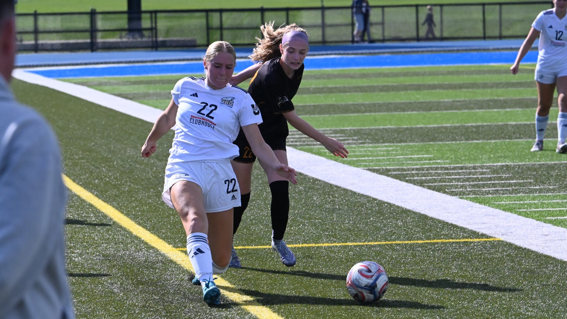 UBC's Chloe Van Schalkwyk is near the sideline with the ball and she fights off a UNBC defender in a away game on Sept. 13, 2026