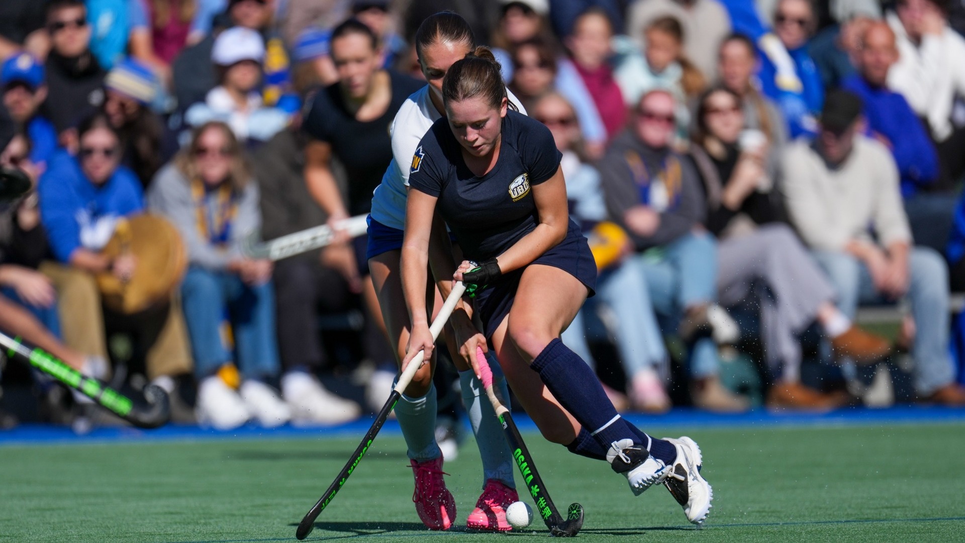 A UBC T-Bird battles for possesion with a defender on her back during a game against the UVic Vikes on Sept. 27, 2026