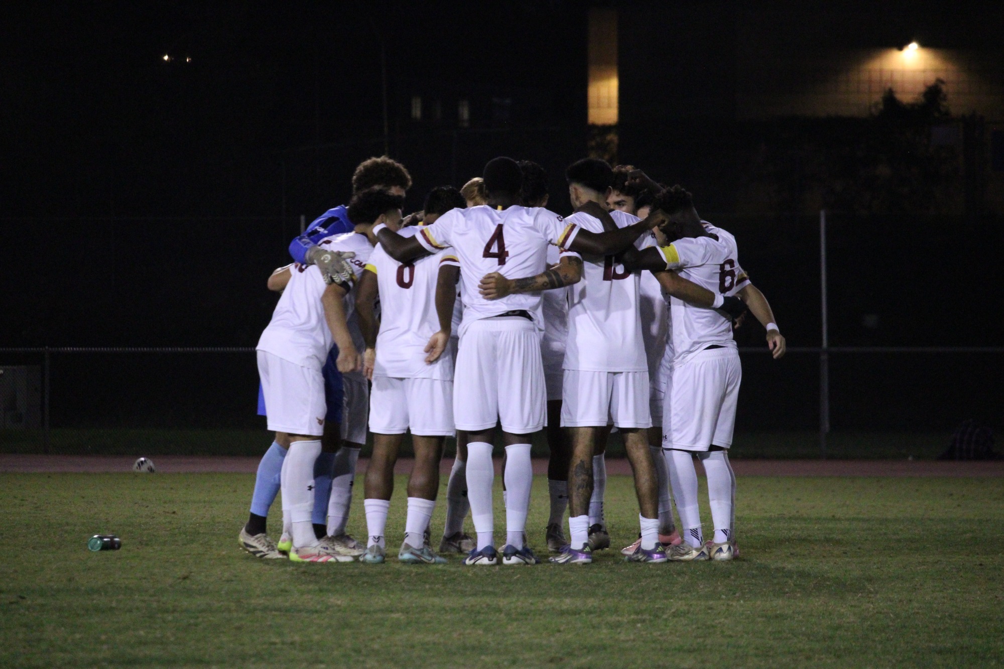 Toro Team huddle men's soccer