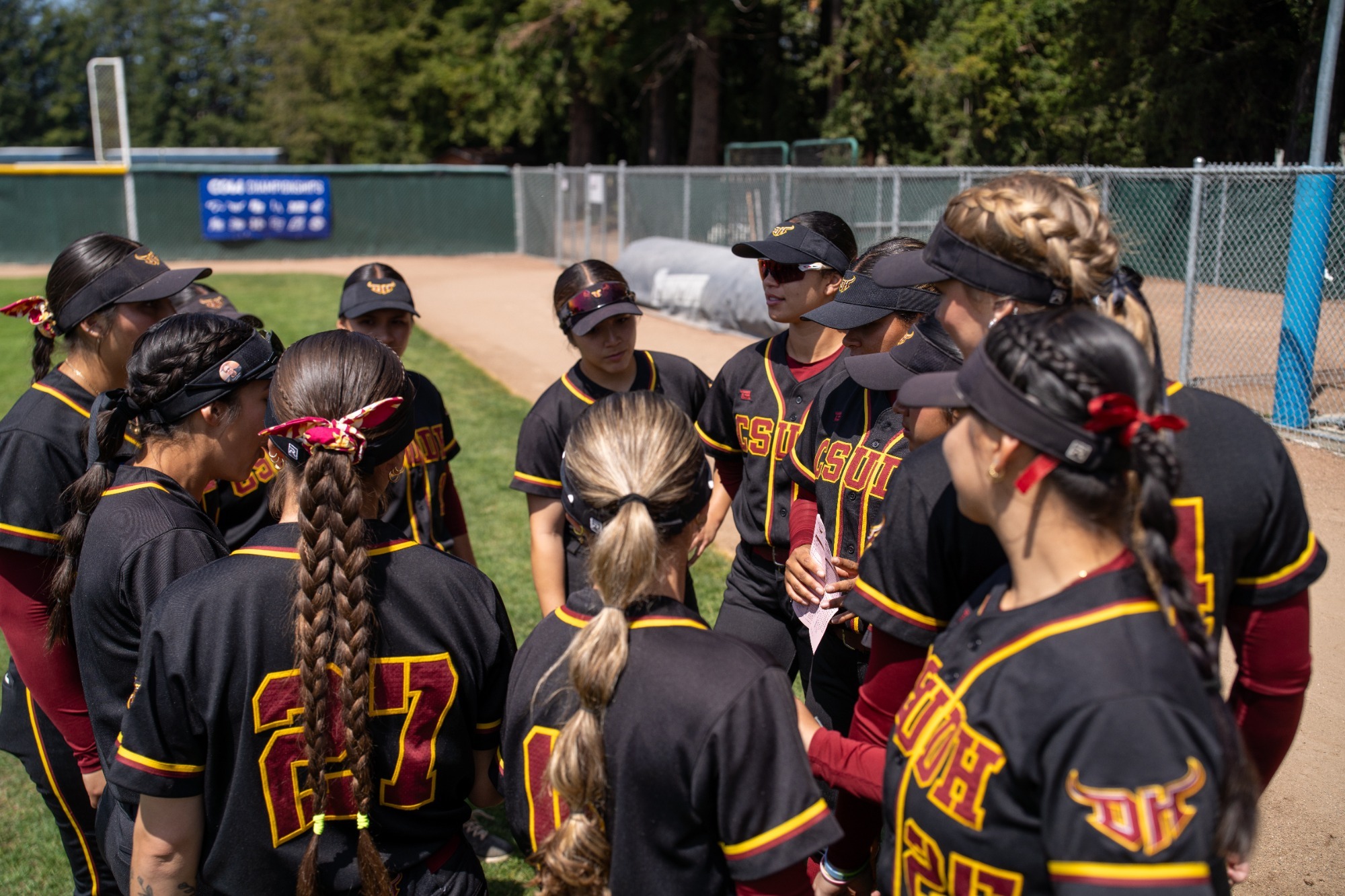 Softball huddle 2025 CCAA Tournament 
